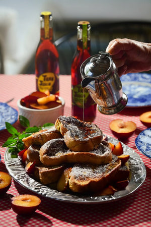 Tree Juice Maple Syrup being poured over French toast